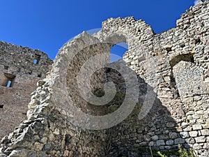 Belfort Ruins or Belfort Castle (Burg Belfort oder Burgruine Belfort) over the river Albula or Alvra, Surava