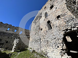 Belfort Ruins or Belfort Castle (Burg Belfort oder Burgruine Belfort) over the river Albula or Alvra, Surava