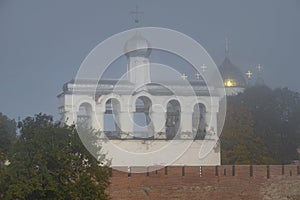 Belfry of the ancient St. Sophia Cathedral in the morning mist. Kremlin of Veliky Novgorod