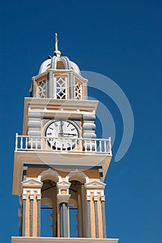 Belfry at blue sky on Santorini island