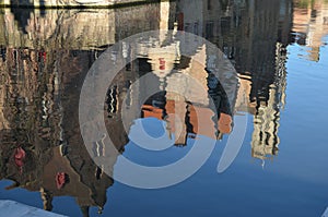 Belfry of Bruges. Early spring reflection photo