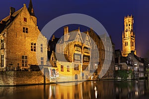 Belfry of Bruges reflected in the canal