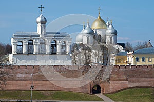 Belfry and domes of St. Sophia Cathedral close up against the background of the blue April sky. Veliky Novgorod, Russia