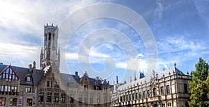 Belfry, houses market square in Bruges / Brugge, Belgium