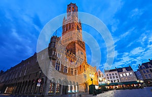 Belfry Tower in historical center of Bruges at night, Belgium.