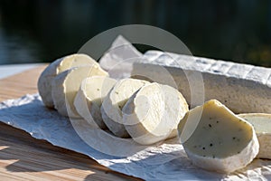 Belgian abbey cheese fagotin in pieces with jam served outdoor, Wallonia, Belgium