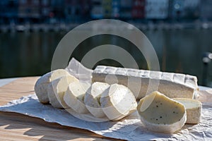 Belgian abbey cheese fagotin in pieces with jam served outdoor, Wallonia, Belgium