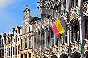 Belgian flag on the Grand Place Broodhuis in Brussels, Belgium.