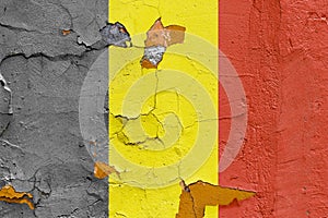 Belgian flag painted on a weathered concrete wall