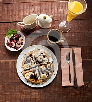 Belgian waffel with juice and coffee