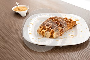 Belgian waffle with honey