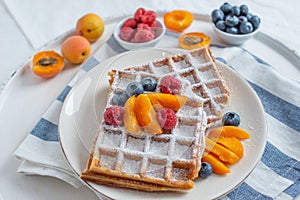 Belgian waffles with fresh berries