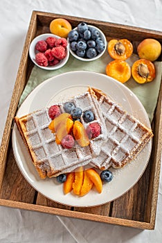 Belgian waffles with fresh berries