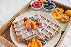 Belgian waffles with fresh berries