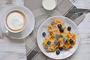 Belgian waffles Healthy breakfast concept blueberry honey mint s