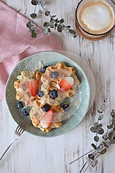 Belgian waffles Healthy breakfast concept blueberry strawberry C