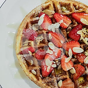Belgian waffles with strawberries, homemade healthy breakfast