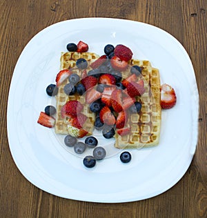 Belgian waffles with strawberry, blueberry