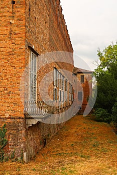 Belgioioso characteristic ancient village vision square church houses detail Po Valley