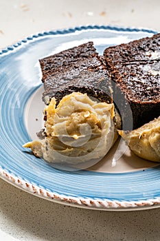 Belgium Chocolate Cake with Peanut Butter Cream served with Plate