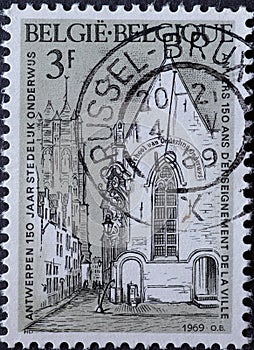 BELGIUM - CIRCA 1969: A postage stamp from Belgium showing a chapel, the first historical school in Antwerp. 150 years anniversary