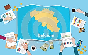 Belgium economy country growth nation team discuss with fold maps view from top