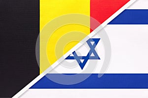 Belgium and Israel, symbol of two national flags from textile. Championship between two countries