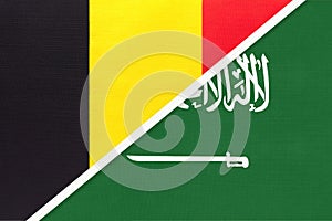 Belgium and Saudi Arabia, symbol of two national flags from textile. Championship between two countries