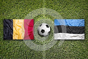 Belgium vs. Estonia flags on soccer field