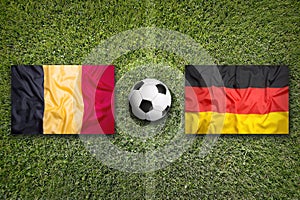 Belgium vs. Germany flags on soccer field