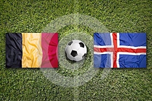 Belgium vs. Iceland flags on soccer field