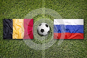 Belgium vs. Russia flags on soccer field