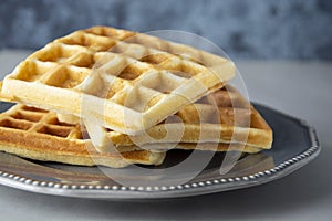 Belgium waffles close up. Homemade breakfast, delcious dessert for children