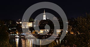 Belgrade night time-lapse with light reflections on the Sava River Water