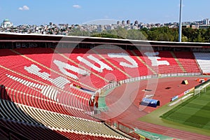 BELGRADE, SERBIA - AUGUST 2019: Red Star stadium Delije sector and city skyline