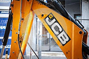 BELGRADE, SERBIA - JULY 22, 2022: JCB logo on one of their machinery engine, an excavator, in a construction site of Belgrade. JCB