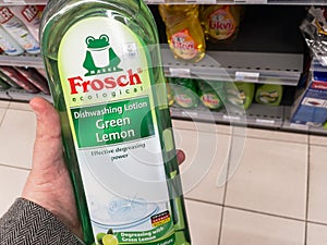 Frosch detergent logo on bottles of dishwashing liquid for sale.