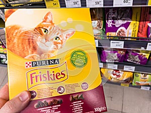 Friskies logo on a pack of cat dry food for sale.