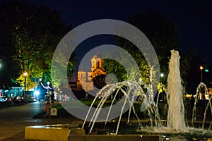 Belgrade, Serbia: St. Mark`s Church in the background, Tasmajdan Park. Night landscape with fountain