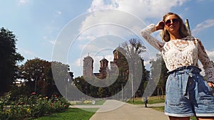 Belgrade, Serbia. A Young Girl Walking in Tasmajdan Park on Summer Day