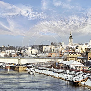 Belgrade Winter Panorama with Sava River Promenade at Savamala area with Branko`s bridge and St. Michael`s Bell Tower