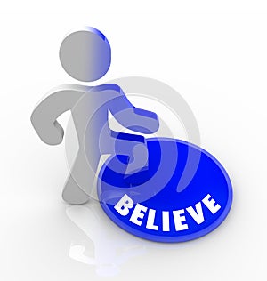 Believe - Person Steps Onto Button with Confidence photo
