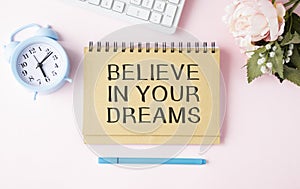 Believe in your Dreams word concept on notepad