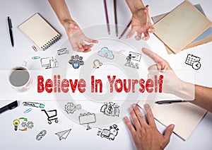 Believe in yourself concept. The meeting at the white office table