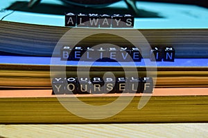 Always believe in yourself written on wooden blocks. Education and business concept