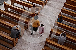 Believer people praying in church