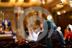 A believer prays in the church of Saint Spiridon in Corfu