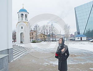 Believing the girl in the shawl baptized at the Orthodox Church