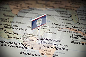 Belize marked with a flag on the map