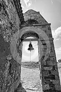 The bell of an ancient church in Methoni, Greece